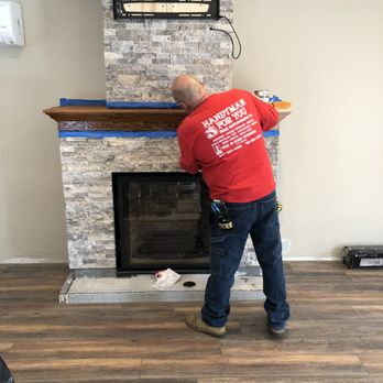 Handyman for you - a picture of a man working on a fireplace - Drywall Installation & Repair Near Me - Staten Island, New York Handyman for you - a picture of a man working on a fireplace - Drywall Installation & Repair Near Me - Staten Island, New York