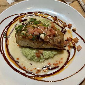 SoNapa Grille - Catch of the day, triple fin on pesto risotto with a lemon cream. - Bars Near Me - Jacksonville Beach, Florida SoNapa Grille - Catch of the day, triple fin on pesto risotto with a lemon cream. - Bars Near Me - Jacksonville Beach, Florida