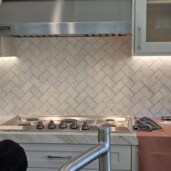 Acosta Tile - a kitchen with a stove and sink - General Contractors Near Me Acosta Tile - a kitchen with a stove and sink - General Contractors Near Me