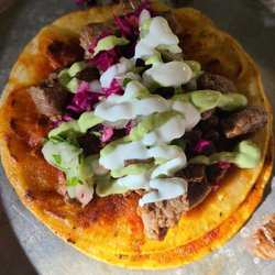 Cactus Mike’s - Bison steak Tacos toasted corn tortillas, lettuce, onion, celantro, lime with sour cream and creamy avocado. Mmmmmm so good