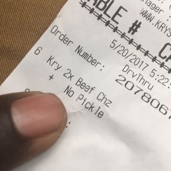 Krystal - a hand holding a receipt - Burgers Near Me - Stockbridge, Georgia