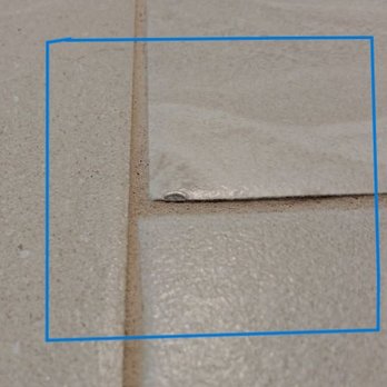 A Perfect Floor - defective tile laid anyway right in front of a doorway - Flooring Near Me - Sanford, Florida