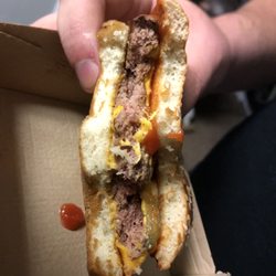 McDonald's - Poor lighting but you can still see the burger is not cooked all the way