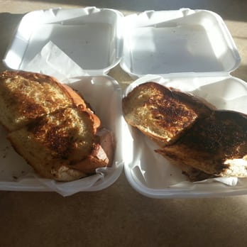 Midtown Deli - The two whole sandwiches toasted with garlic butter barely fit in the boxes. - Delis Near Me - Post Falls, Idaho Midtown Deli - The two whole sandwiches toasted with garlic butter barely fit in the boxes. - Delis Near Me - Post Falls, Idaho