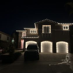 Frank's Jolly Lights - Late night touch up on windows.