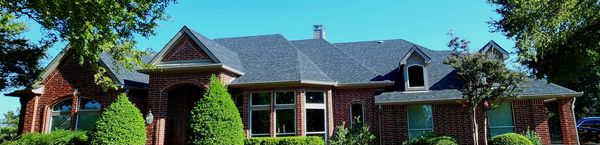 Radnov Roofing & Construction Logo