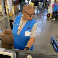 Walmart - Rude and over involved. She's not my grandmother. Watch that mouth.