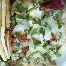 What is that white sauce? Ranch? Queso? Who knows? It's not on the menu and Al pastor DOES NOT HAVE WHITE SAUCE. What is that white sauce? Ranch? Queso? Who knows? It's not on the menu and Al pastor DOES NOT HAVE WHITE SAUCE.