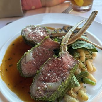 Eiffel Tower Restaurant - Herb Crusted Rack of Lamb, Truffle Bread Pudding, Green Bean Tourangelle, Lamb Jus - French Near Me - Las Vegas, Nevada Eiffel Tower Restaurant - Herb Crusted Rack of Lamb, Truffle Bread Pudding, Green Bean Tourangelle, Lamb Jus - French Near Me - Las Vegas, Nevada