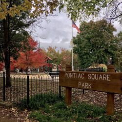 Pontiac Square Park - A fence surrounds the park.