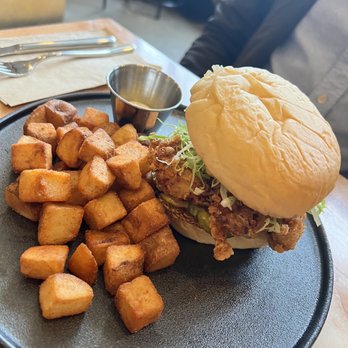 Their There - Fried chicken burger with side of hashbrowns - Breakfast & Brunch Near Me - Vancouver, British Columbia Their There - Fried chicken burger with side of hashbrowns - Breakfast & Brunch Near Me - Vancouver, British Columbia