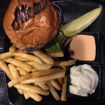 The Kitchen at Atomic - Hamburger with fried egg and a side of fries and a pickle. Atomic aioli and mayo on the side. - New American Near Me - Las Vegas, Nevada The Kitchen at Atomic - Hamburger with fried egg and a side of fries and a pickle. Atomic aioli and mayo on the side. - New American Near Me - Las Vegas, Nevada