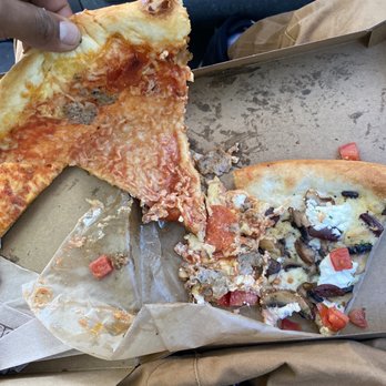 Pagliacci Pizza - Pizza just sucks. Especially when it's not proofed right so the dough is soggy and the cheese is sliding right off. - Pizza Near Me - Mercer Island, Washington