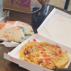 Taco Bell - #9 Mexican pizza comes two hard shell taco sup. drink.  didn't like the pizza sauce it was too spicy they remade me one without it