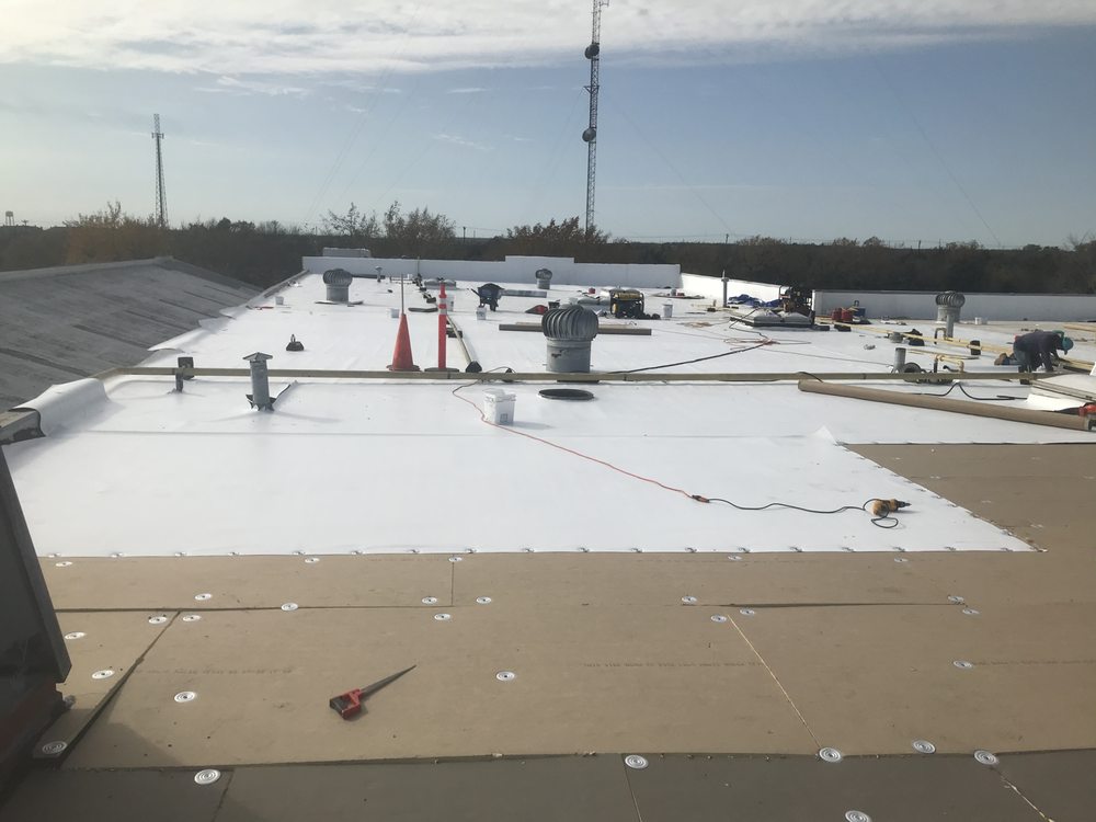 Slide of ETX Roofing and Construction