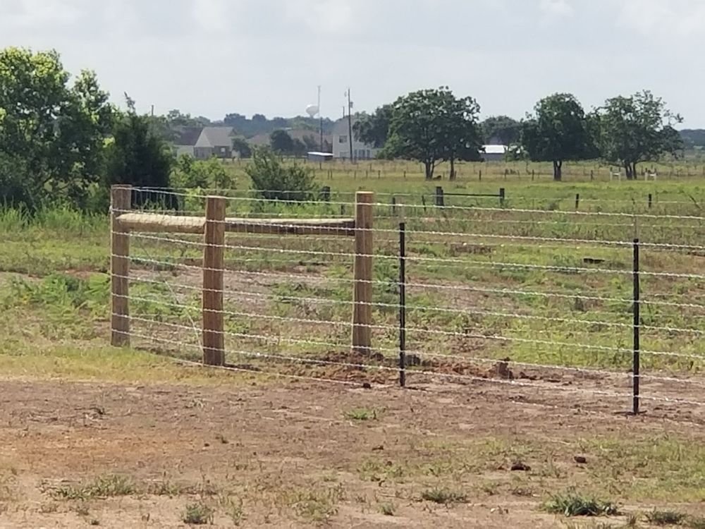 Slide of Pride of Texas Roof and Fence