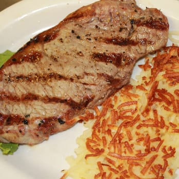 Peppermill Restaurant - a steak and potato hash browns - Steakhouses Near Me - Bad Axe, Michigan