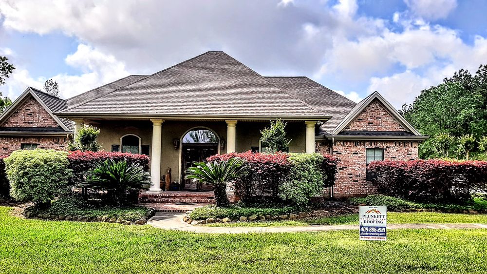Slide of Plunkett Roofing