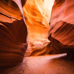 Deer Spring Canyon Tours - Experience the mesmerizing beauty of Secret Canyon, where sunlight filters through narrow sandstone walls, casting a warm golden glow