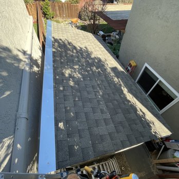 Ryan is Handy - a view of the roof of a house - Handyman Near Me