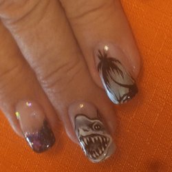 Venus Nails & Spa - The sharks & palm trees Steve painted on my wifes nails!!!