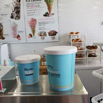 Marble Slab Creamery - two ice cream cups on a counter - Ice Cream & Frozen Yogurt Near Me - College Station, Texas