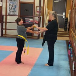 Taylor Martial Arts - Earning yellow black stipe belt