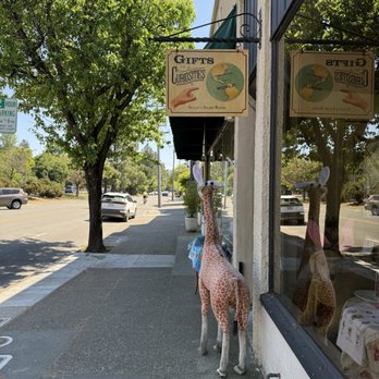 Susan's Store Room - Beautiful shop sign with a stuffed giraffe standing guard on San Anselmo Avenue - Toy Stores Near Me - San Anselmo, California Susan's Store Room - Beautiful shop sign with a stuffed giraffe standing guard on San Anselmo Avenue - Toy Stores Near Me - San Anselmo, California