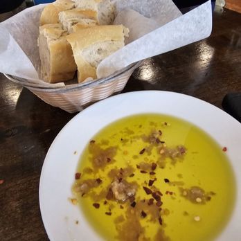 Zeffiro's Pizzeria Downtown - A basket of bread with garlic and oil. - Pizza Near Me - Las Cruces, New Mexico Zeffiro's Pizzeria Downtown - A basket of bread with garlic and oil. - Pizza Near Me - Las Cruces, New Mexico