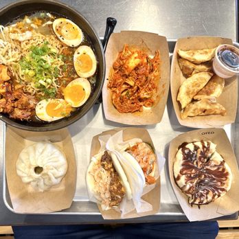 Le Bao - a variety of food items on a tray - Asian Fusion Near Me - Columbia, Missouri