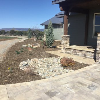 Down To Earth Landscaping - front of home - Landscaping Near Me