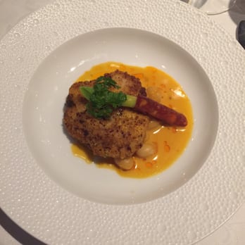 The Waterside Inn - Breaded medallion of monkfish served on simmered coco beans with tomato, chorizo flavoured sauce - French Near Me - Bray, WNM
