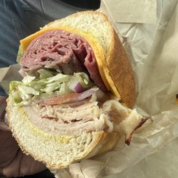 Turkey/Pastrami/Mayo/Mustard/LT/RedOnions/Pickles on a Soft Roll . 10/10