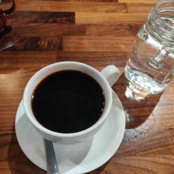 Cafe De Olla - Normal coffee in the white cup. Cafe de Olla coffee in the brown cup in the top left! Heh heh. Water in the mason jar cup. - American Near Me - Monrovia, California