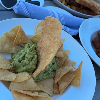 Rivermarket Bar and Kitchen - Guacamole (front) and brisket grilled (back) - New American Near Me - Tarrytown, New York