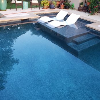 Pond Springs Custom Pools - The pretty gunite bottom and shallow tanning deck makes the water look extra cool and refreshingly blue. - Pool & Hot Tub Service Near Me - Round Rock, Texas Pond Springs Custom Pools - The pretty gunite bottom and shallow tanning deck makes the water look extra cool and refreshingly blue. - Pool & Hot Tub Service Near Me - Round Rock, Texas