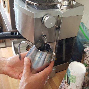 98 Wake 'N Shake - person using a coffee machine - Coffee & Tea Near Me - Bangor, Maine 98 Wake 'N Shake - person using a coffee machine - Coffee & Tea Near Me - Bangor, Maine