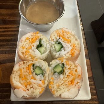 Pho Amsterdam - a plate of sushi rolls and a bowl of sauce - Vietnamese Near Me - New York, New York Pho Amsterdam - a plate of sushi rolls and a bowl of sauce - Vietnamese Near Me - New York, New York