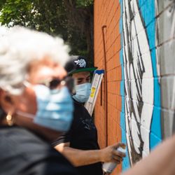George Floyd Mural - Mural artist Donkeemom and son Donkeeboy working alongside eachother | Photo: David 'Odiwams' Wright