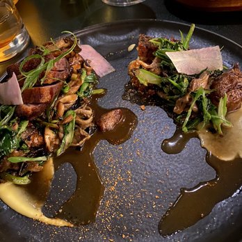 Highlands - Tasted much better than it looked. Duck entree...loved the sunchokes & crispy rice - New American Near Me - Detroit, Michigan