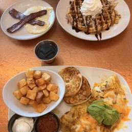 Cookie dough waffle with eggs and bacon, and a Chorizo & Avocado Omelette with country potatoes !