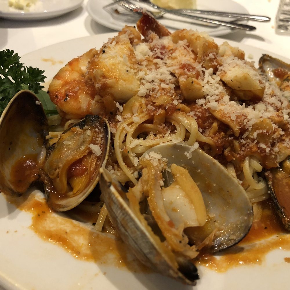 Assaggio Bistro - Small portion of seafood combination in tomato sauce. Generous seafoods but a bit bland - Italian Near Me - Honolulu, Hawaii