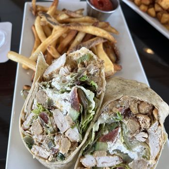 Coasters - The chickpea chicken wrap with fresh LOCAL goat cheese it was just missing a creamy sauce factor - Breakfast & Brunch Near Me - Aransas Pass, Texas Coasters - The chickpea chicken wrap with fresh LOCAL goat cheese it was just missing a creamy sauce factor - Breakfast & Brunch Near Me - Aransas Pass, Texas