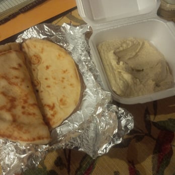 Greek Wraps - Fresh pita bread and hummus. Bad picture, but the food is amazing! - Greek Near Me - Peoria, Arizona