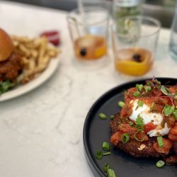Bird Dog - Chicken sandwich. Fried green tomatoes w burrata and red tomato topping.