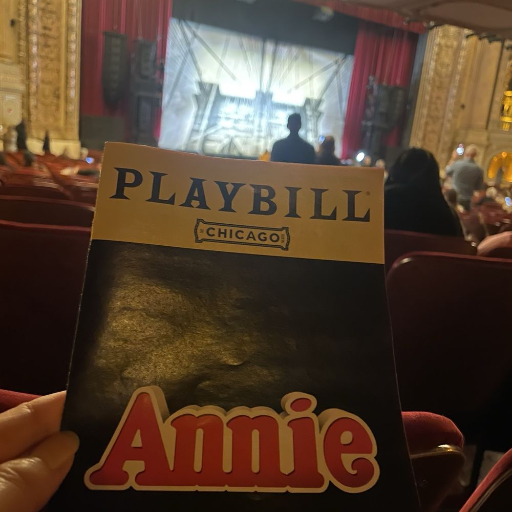 Watching the show, "Annie". Watching the show, "Annie".