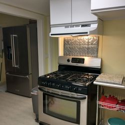 Garrity Appliance - Gas range and new fridge