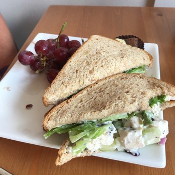 The Chocolate Season - Chicken salad sandwich on wheat with a side of grapes and a brownie bite. The perfect lunch on a hot summer day. - Desserts Near Me - Lincoln, Nebraska The Chocolate Season - Chicken salad sandwich on wheat with a side of grapes and a brownie bite. The perfect lunch on a hot summer day. - Desserts Near Me - Lincoln, Nebraska