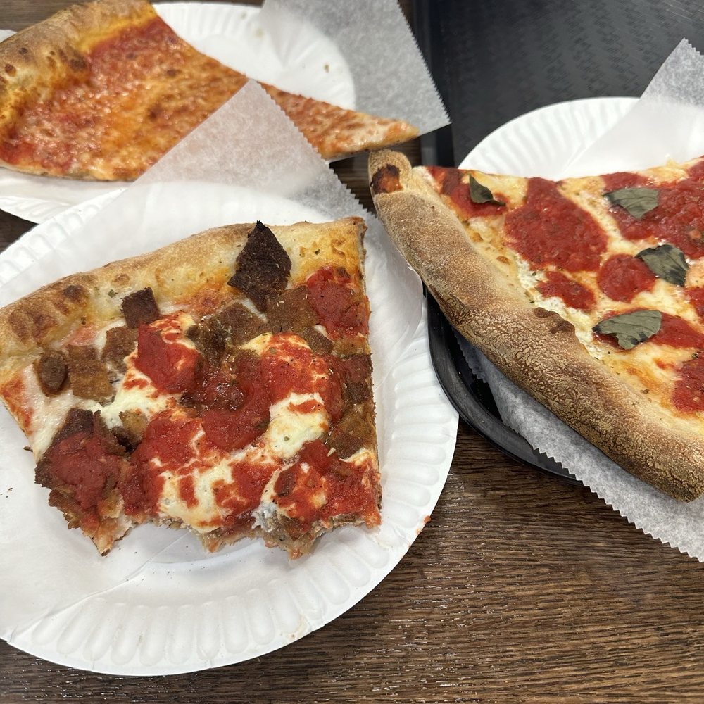 Gigis Pizza - Slices of Eggplant ricotta, margherita and classic cheese - Pizza Near Me - New Hyde Park, New York Gigis Pizza - Slices of Eggplant ricotta, margherita and classic cheese - Pizza Near Me - New Hyde Park, New York