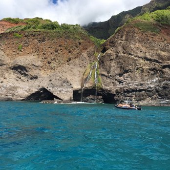 Na Pali Experience - Waterfall along coast - Boating Near Me - Kekaha, Hawaii Na Pali Experience - Waterfall along coast - Boating Near Me - Kekaha, Hawaii